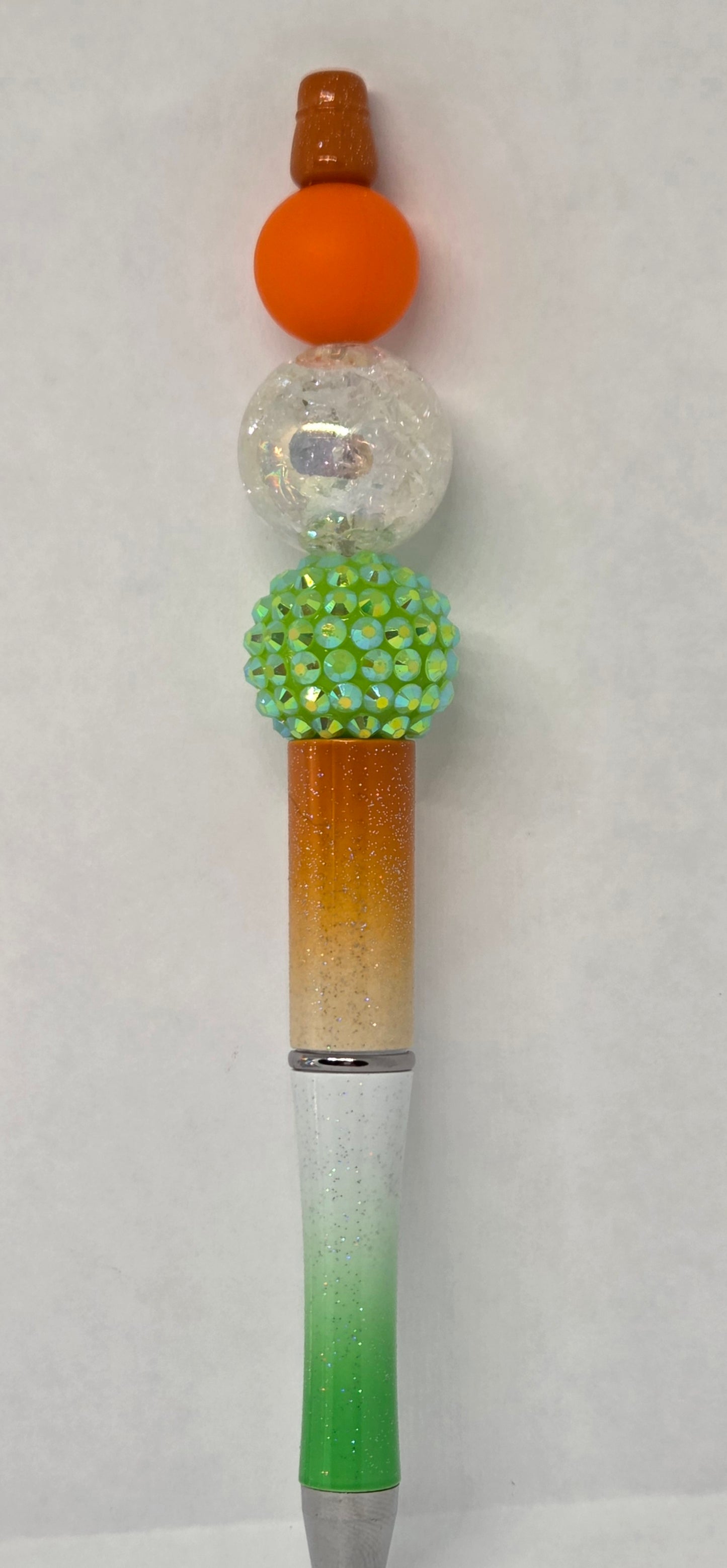 Orange and green pen