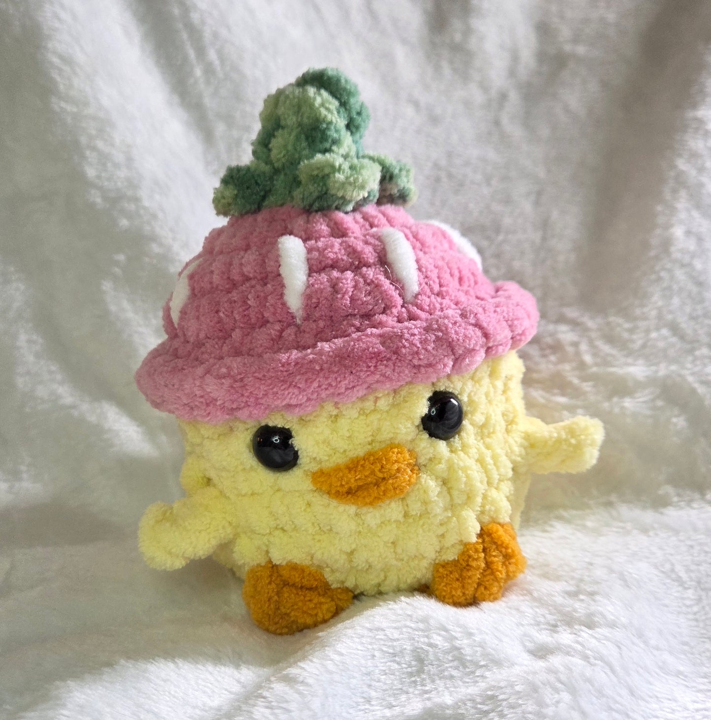 Chick with strawberry hat