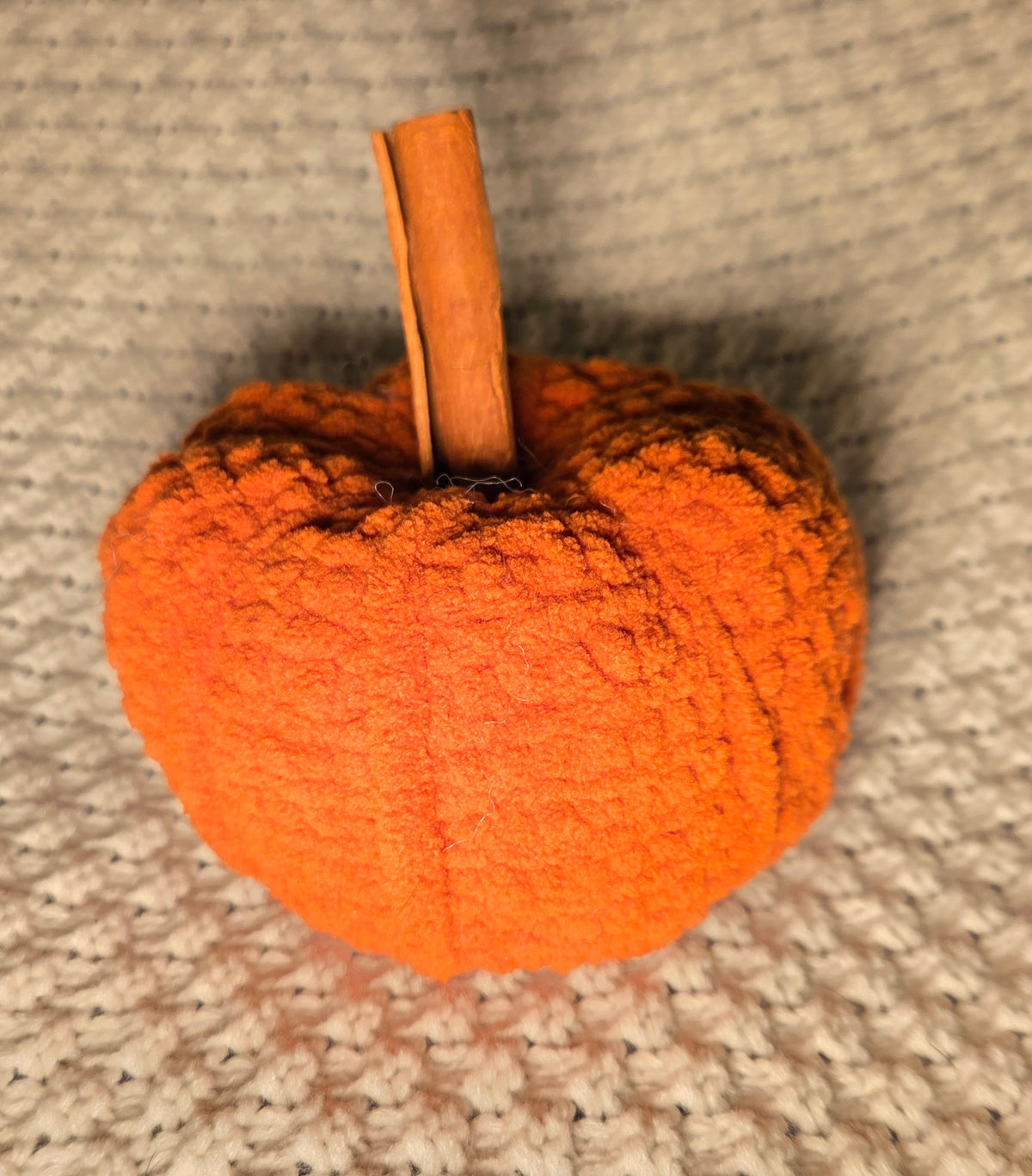 Pumpkin crochet plushie with cinnamon stick stem