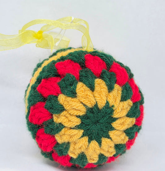 Red green and gold ornament