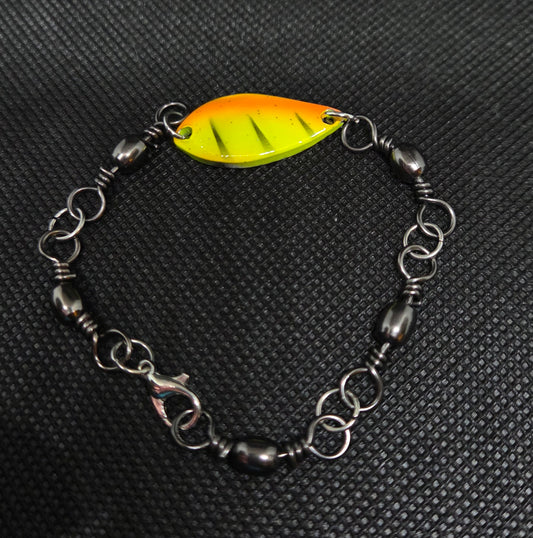 Fishing swivel bracelet with yellow and orange spoon lure