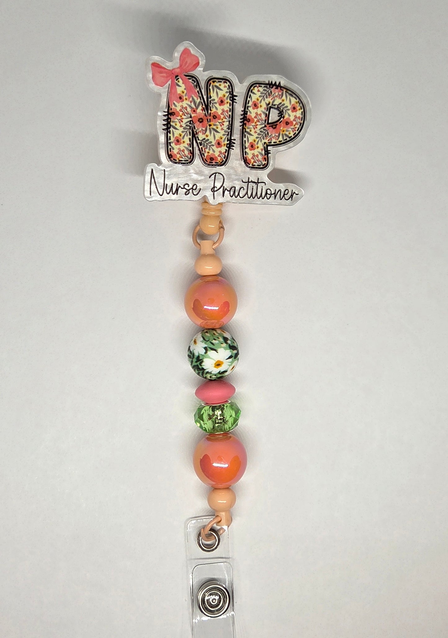 NP badge reel
