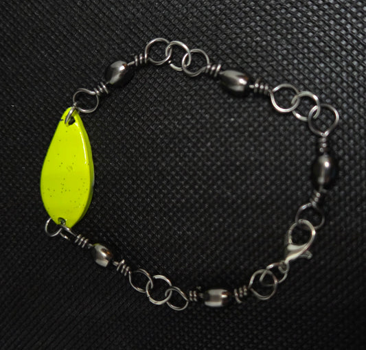 Fishing swivel bracelet with yellow spoon lure