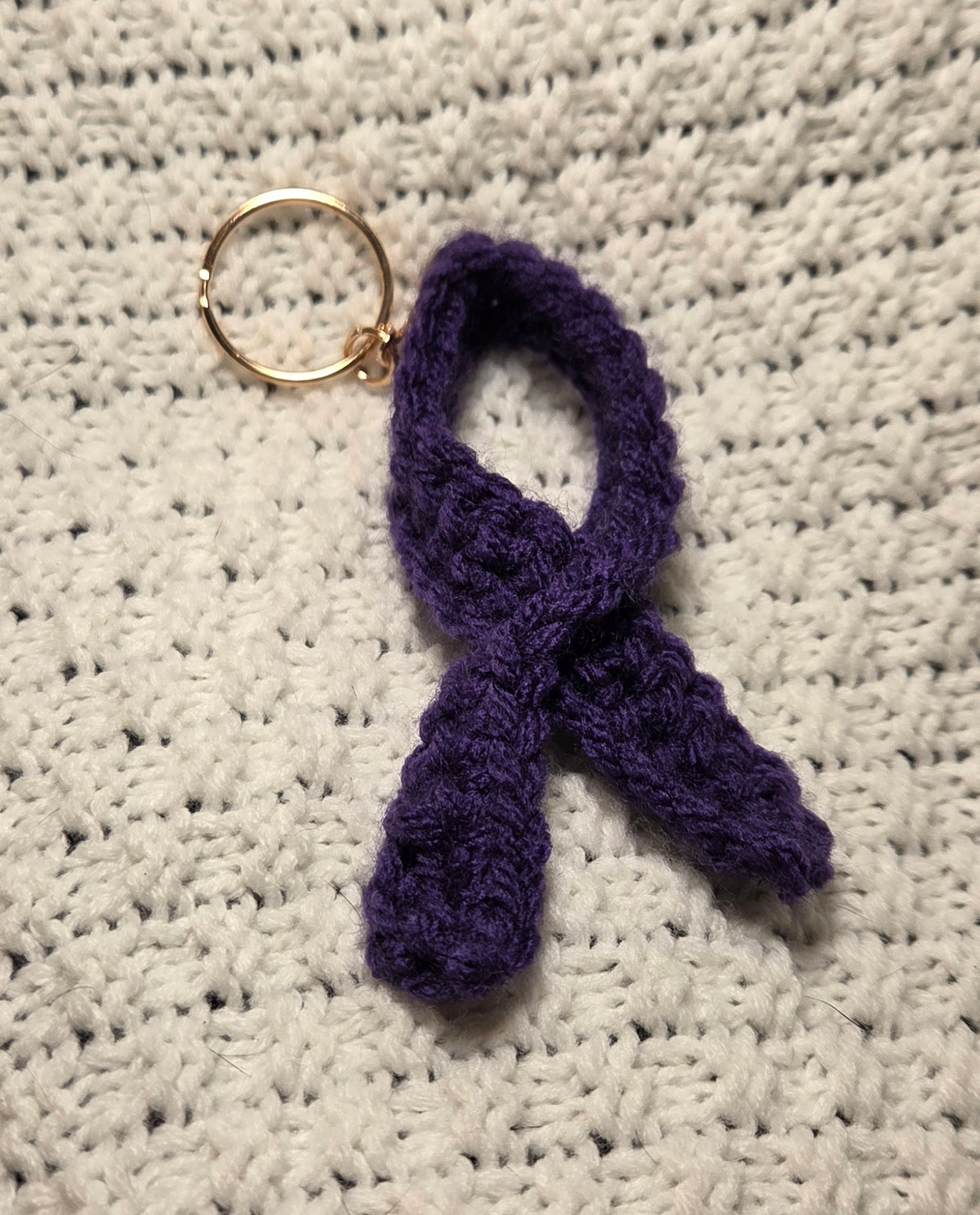 Dark purple awareness ribbon