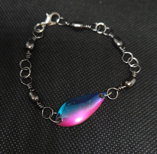 Fishing swivel bracelet with blue and pink spoon lure