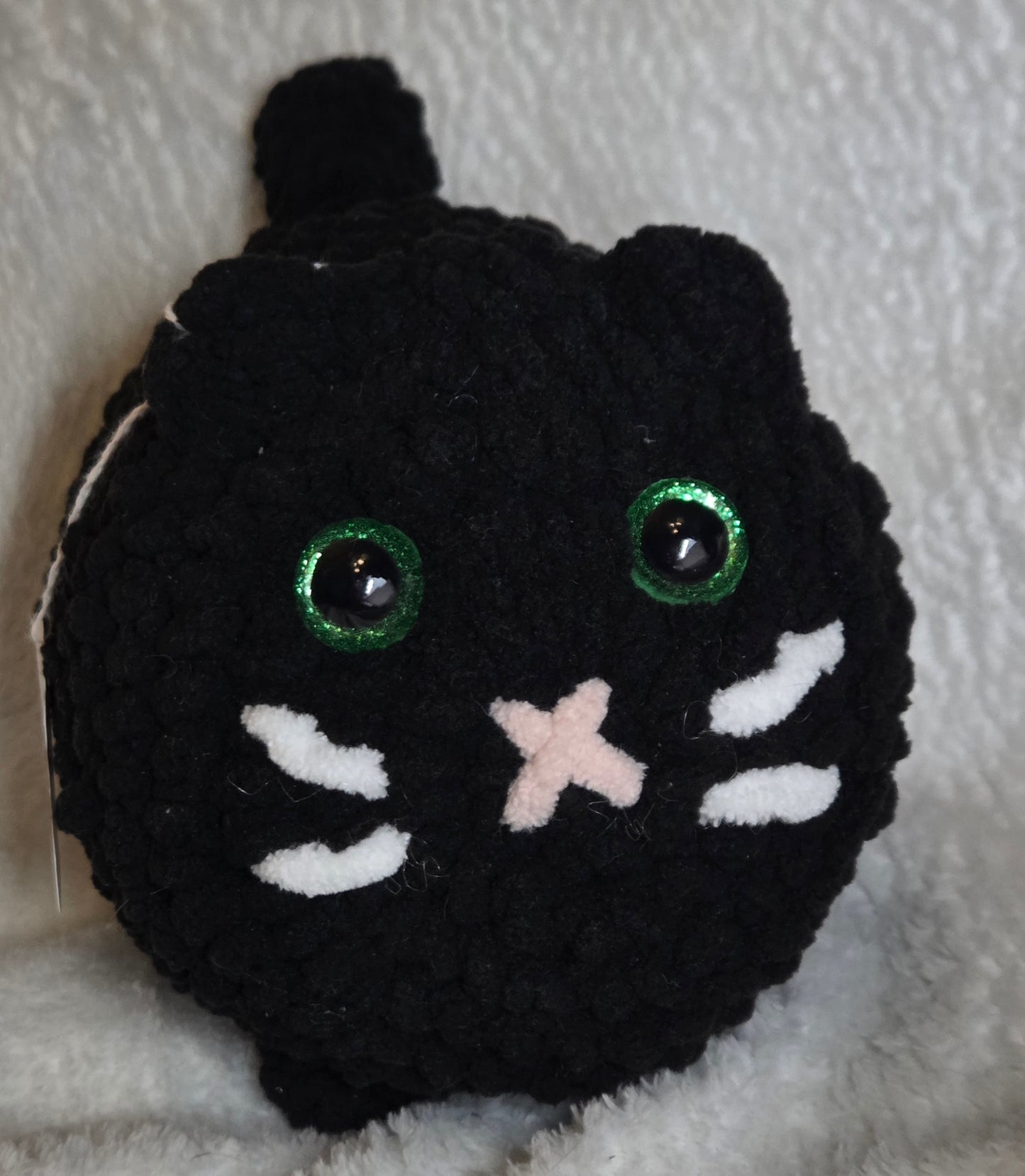 Black cat plushie